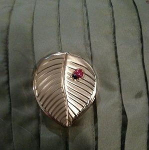 Estee Lauder ladybug on leaf compact